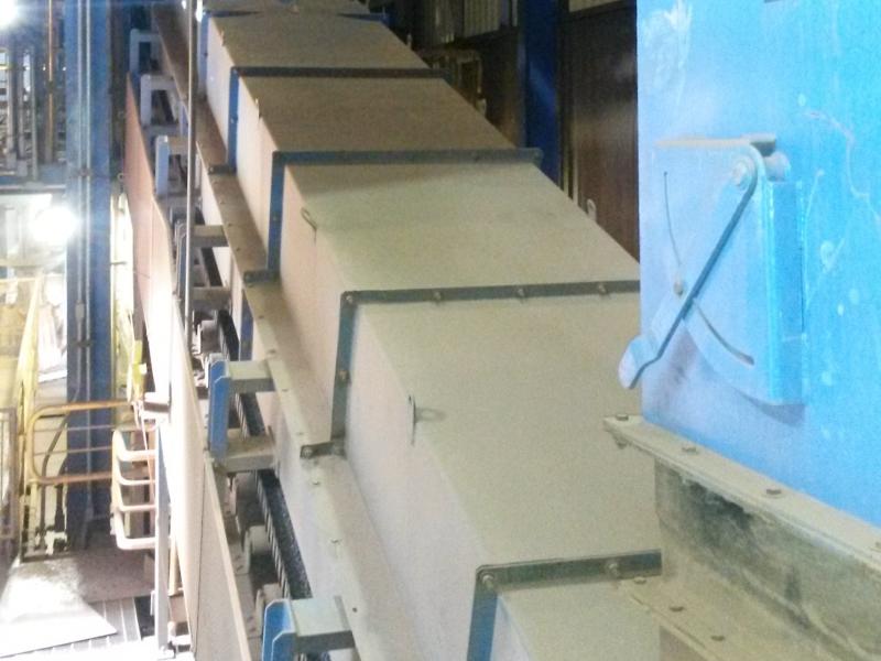 hot sinter transport in a fully enclosed conveyor